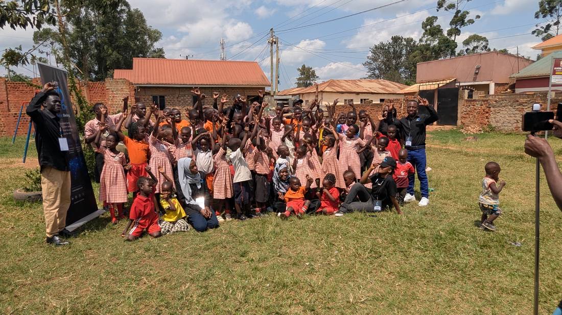 CodeOn team with students outdoors